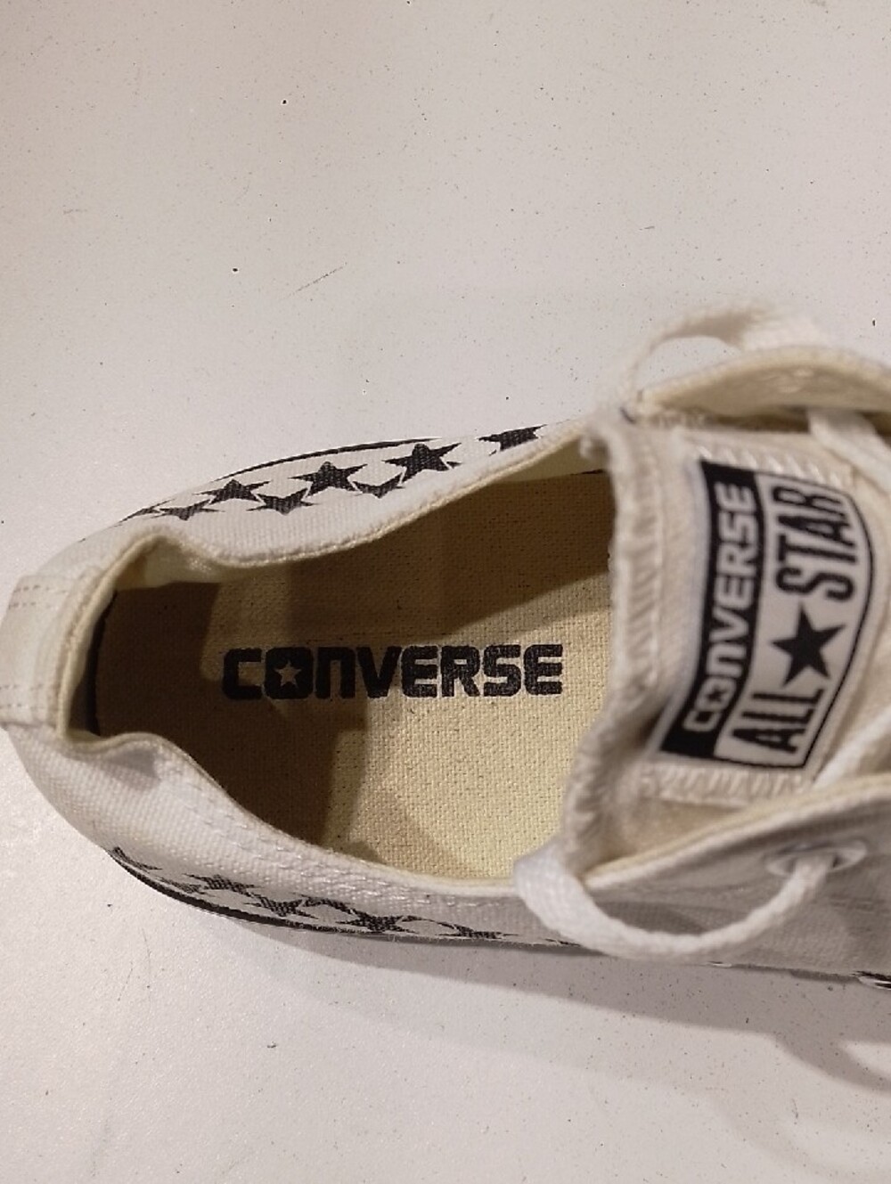 Converse White Low Top Sneakers with Black Star Pattern - Picture 2 of 6